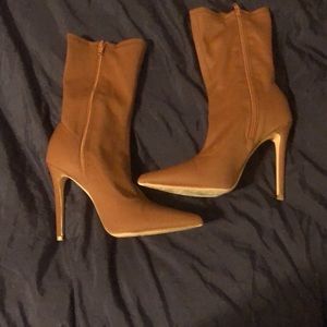 Calf high classy pointed heels